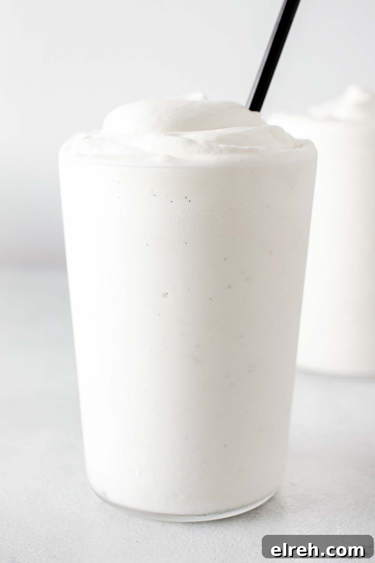 Vanilla Bean Frappuccino Starbucks Copycat Recipe 9 Vanilla Bean Frappuccino with whipped cream in a cup.