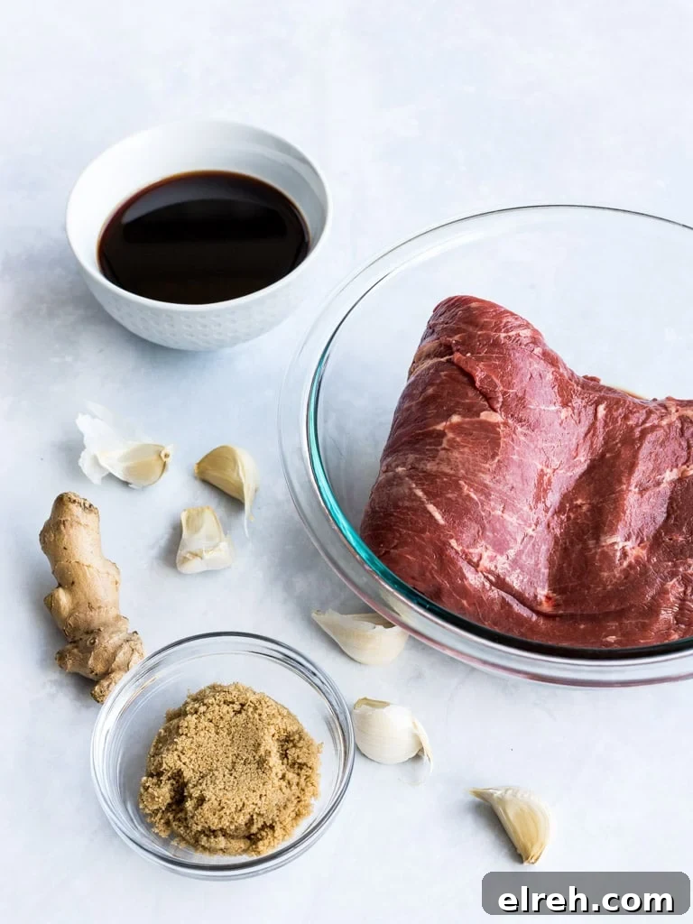 Flank steak and ingredients for an Asian steak marinade with brown sugar, soy sauce, garlic, and ginger