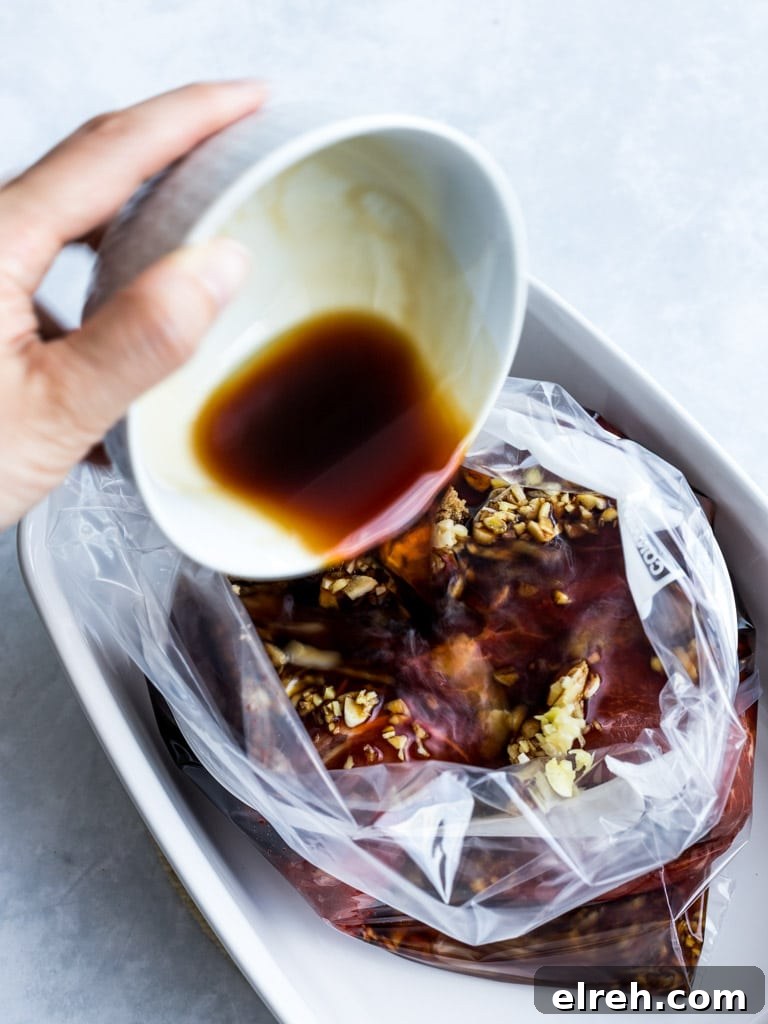 Asian flank steak marinade poured into a ziplock bag