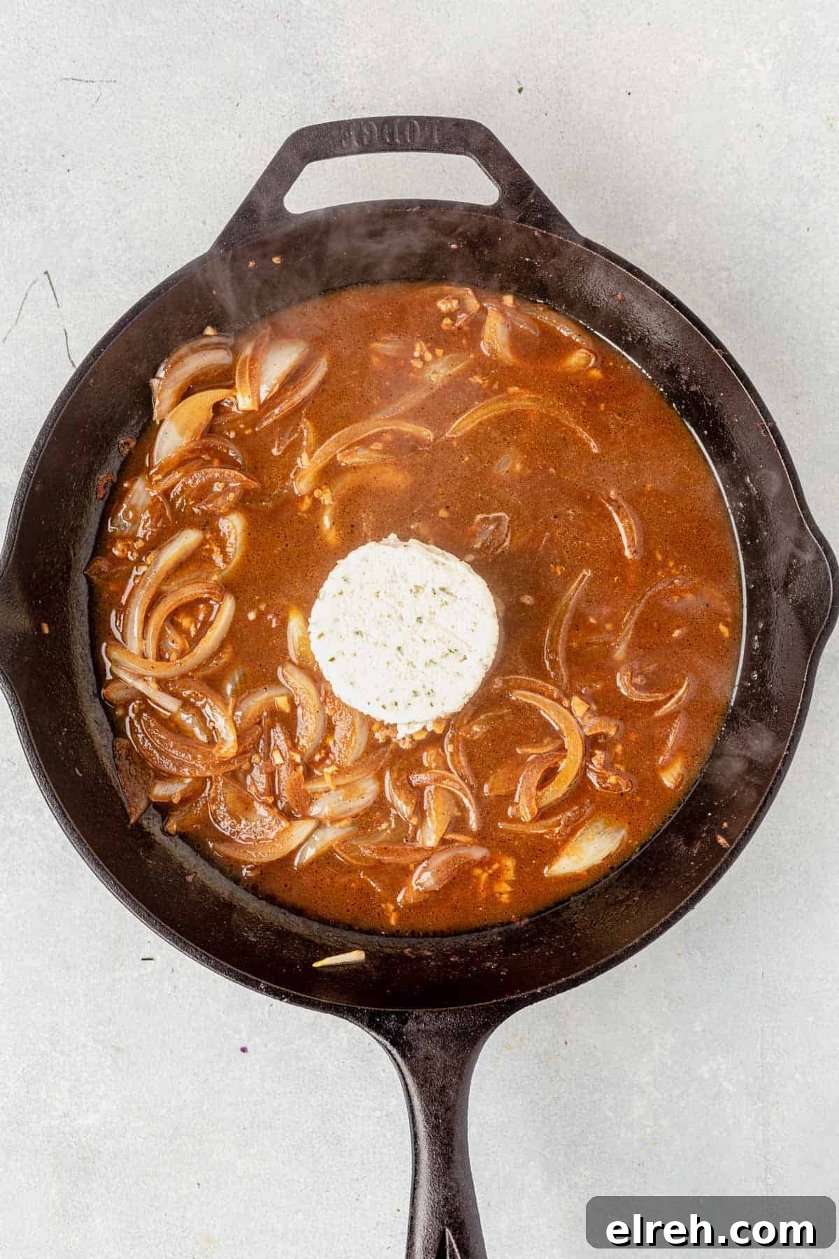 melting boursin cheese into sauce