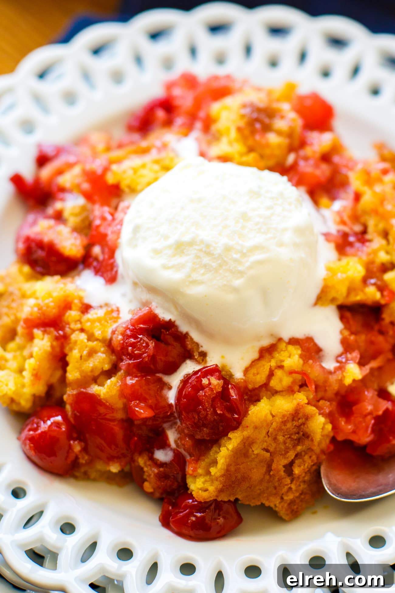 Irresistible Cherry Pineapple Dump Cake Recipe 2 pineapple cherry dump cake with ice cream in bowl