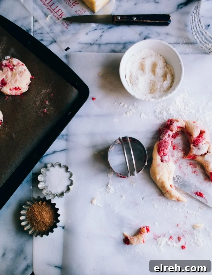 Cutting out raspberry scone dough
