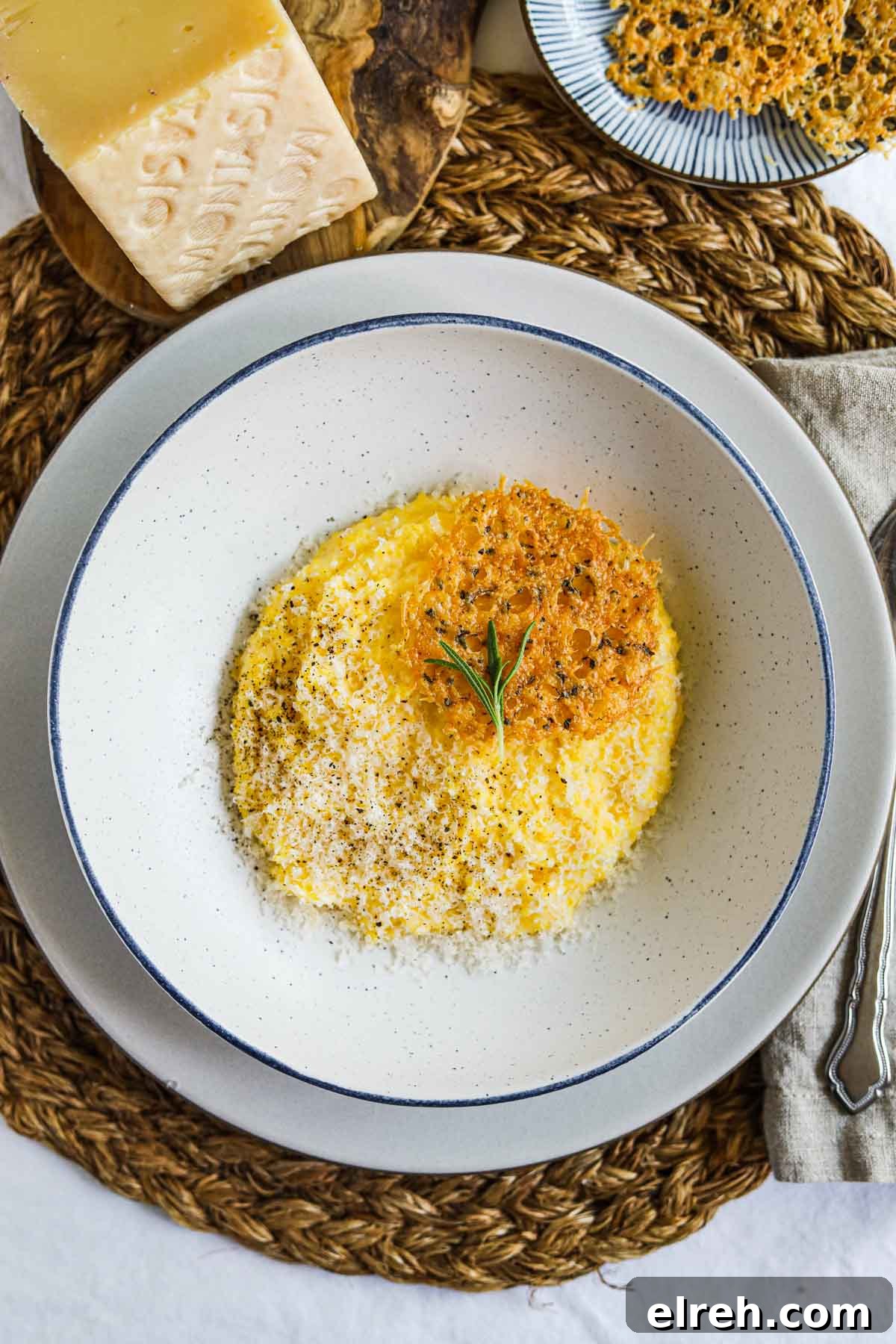 22 Delicious Sides to Serve with Chicken Wings 18 Creamy polenta with parmigiano-reggiano, rosemary, and frico (montasio cheese crisps) in a bowl.