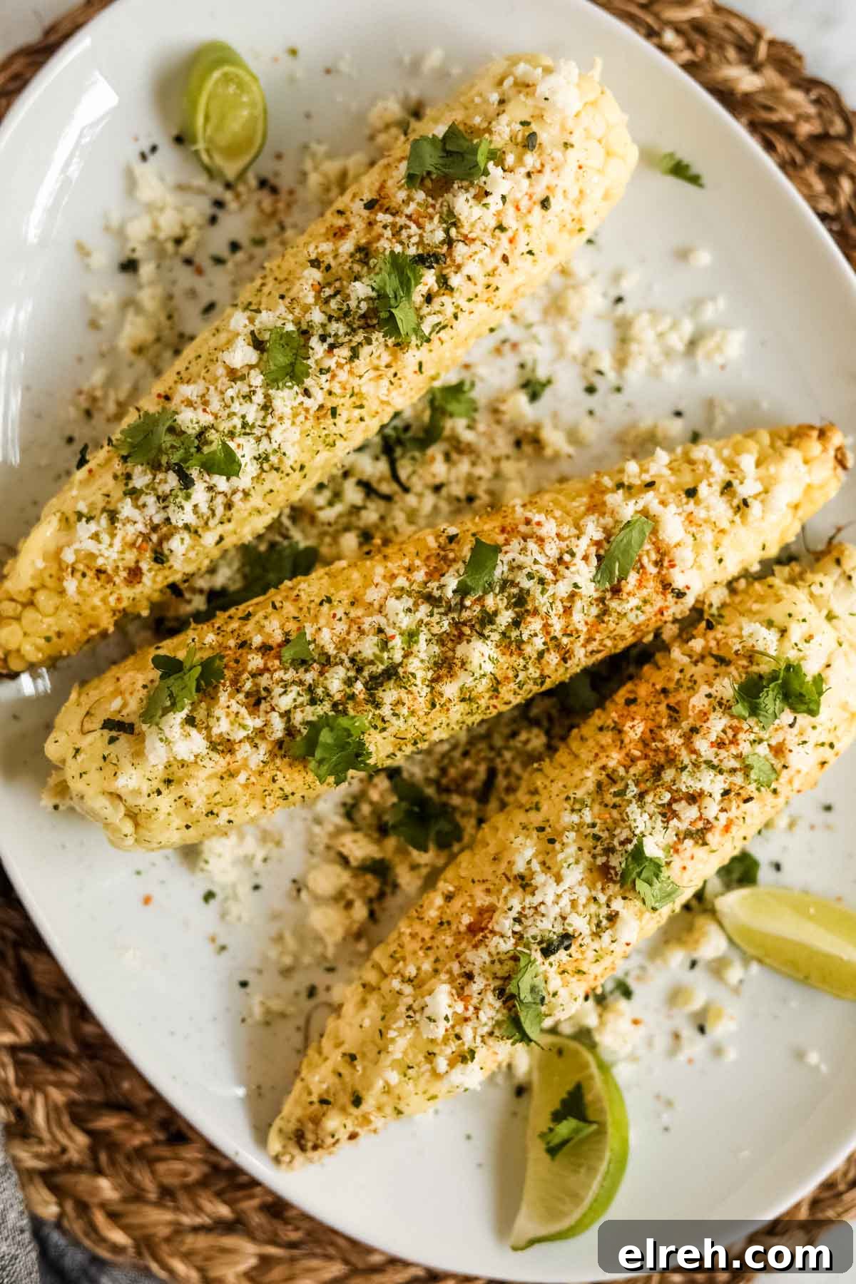 22 Delicious Sides to Serve with Chicken Wings 4 Elote-style corn with furikake and kewpie mayo on a plate flatlay.