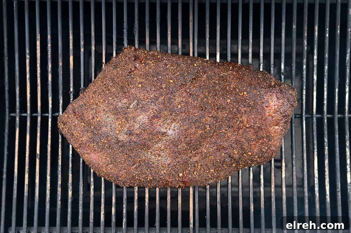 brisket pastrami on smoker after several hours.