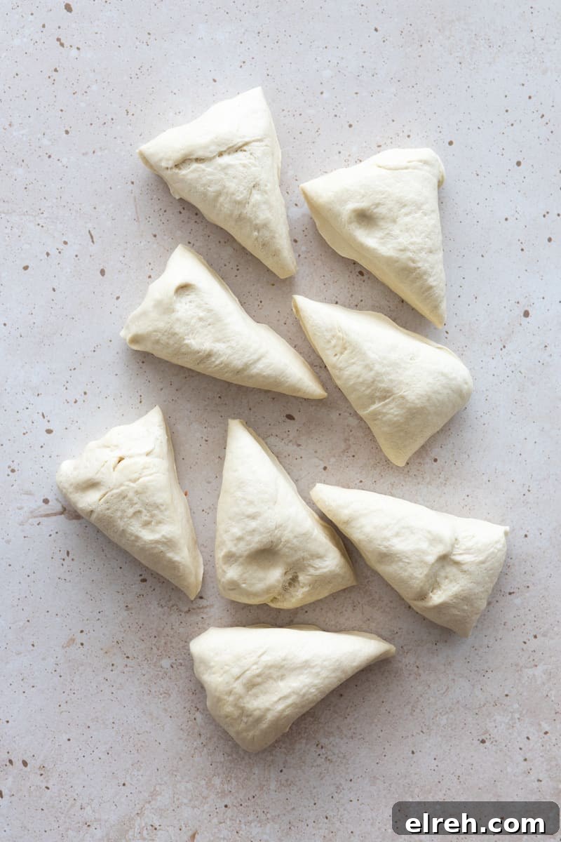 Dough divided into eight equal-size pieces. 