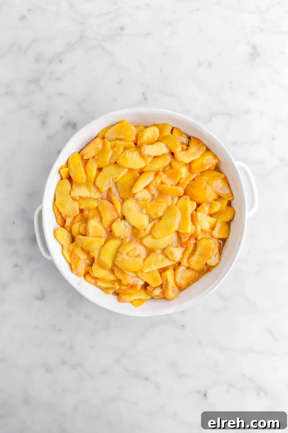 Peach Cobbler Crisp with Brown Sugar and Cinnamon 14 peach filling in round casserole.