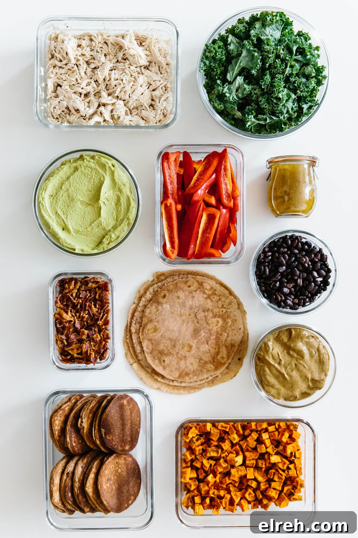 Meal prepped individual ingredients in containers.