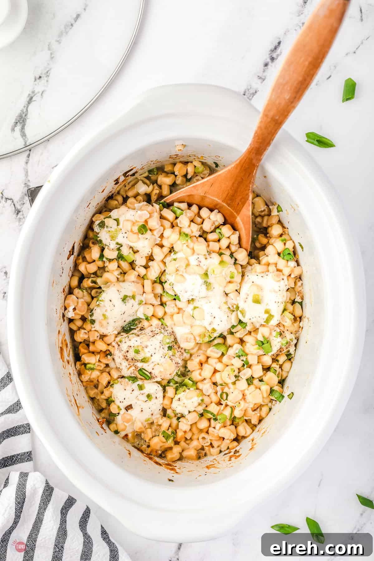 Crock Pot Cheesy Corn Dip Recipe 6 corn and spoon in a bowl
