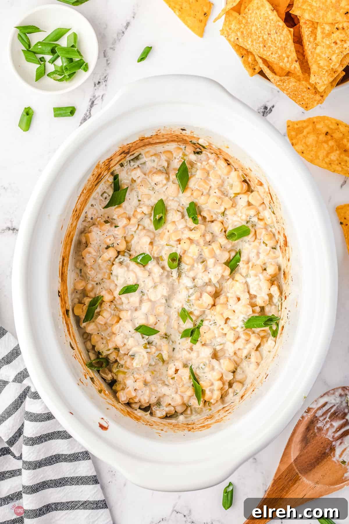Crock Pot Cheesy Corn Dip Recipe 8 corn dip in a white crock pot bowl
