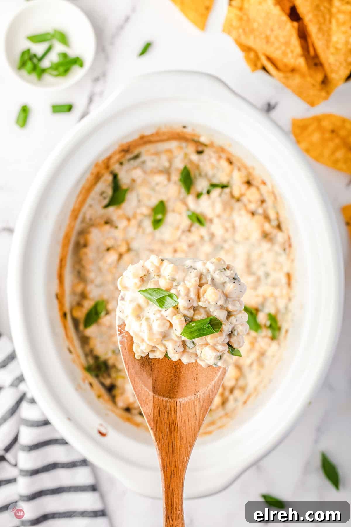 Crock Pot Cheesy Corn Dip Recipe 9 spoon of corn dip
