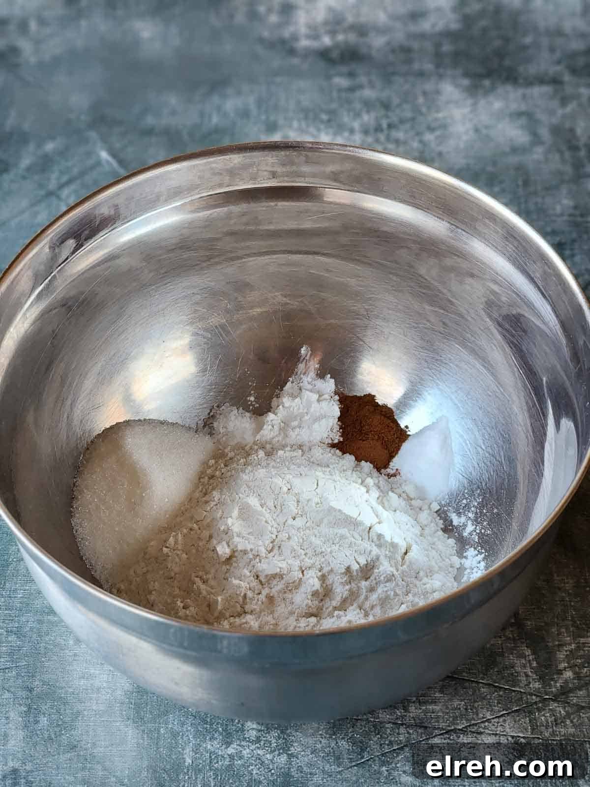 Fluffy Sweet Cream Cinnamon Pancakes Recipe 4 Dry ingredients in a bowl for sweet cream pancakes.