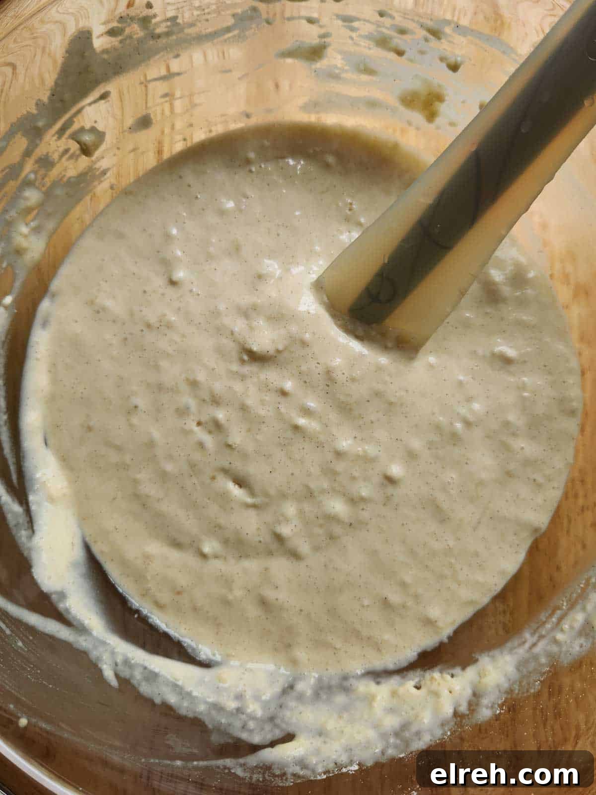 Fluffy Sweet Cream Cinnamon Pancakes Recipe 5 Batter for sweet cream pancakes in a clear bowl.