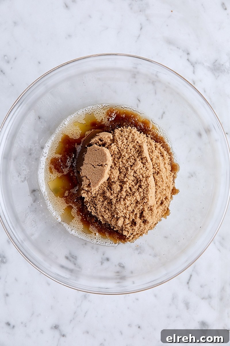 Chewy Chocolate Toffee Blondies Recipe 5 Melted brown butter and brown sugar in glass bowl