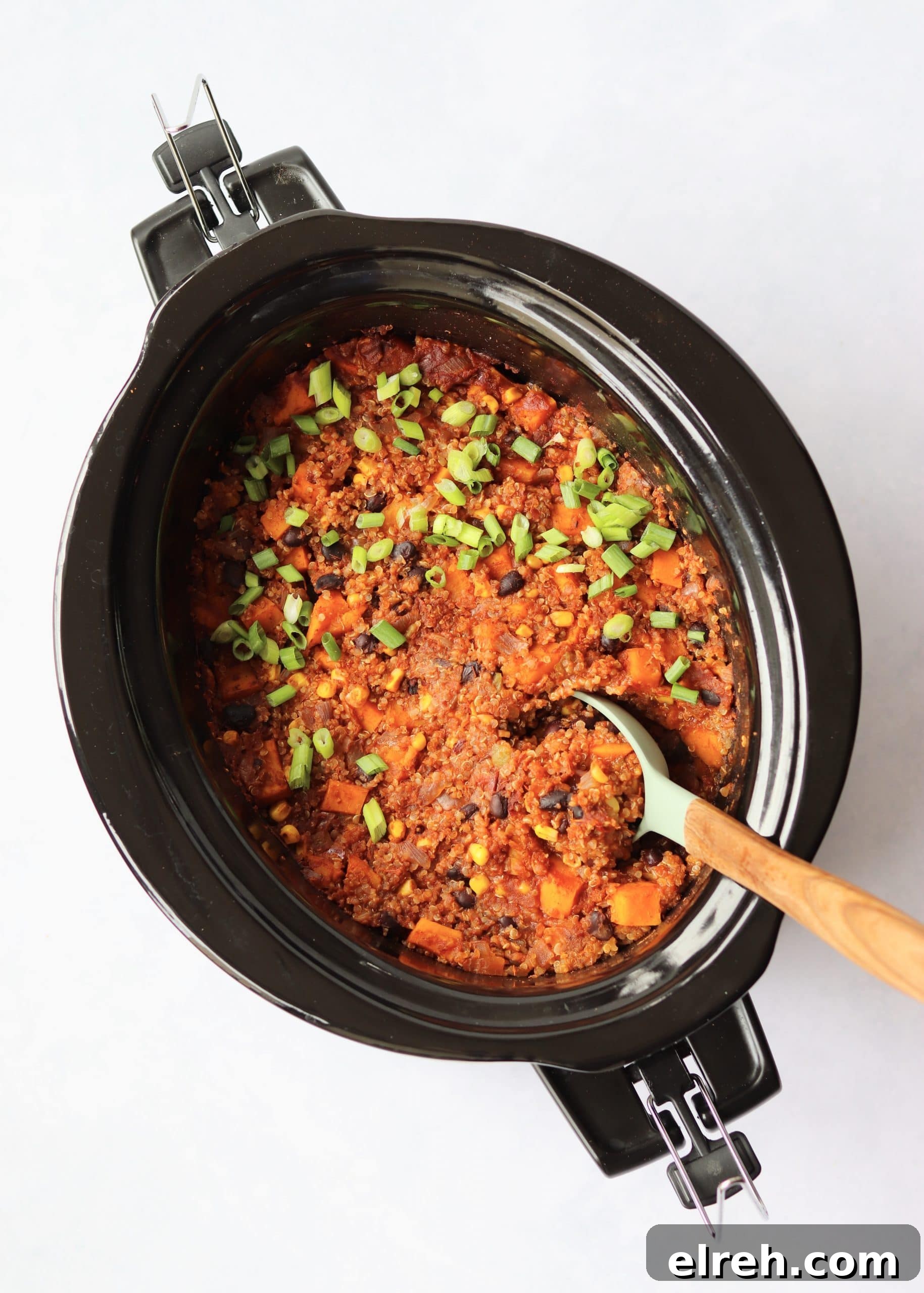 Vegan Slow Cooker Mexican Quinoa Recipe 4 Slow Cooker Mexican Quinoa with serving spoon