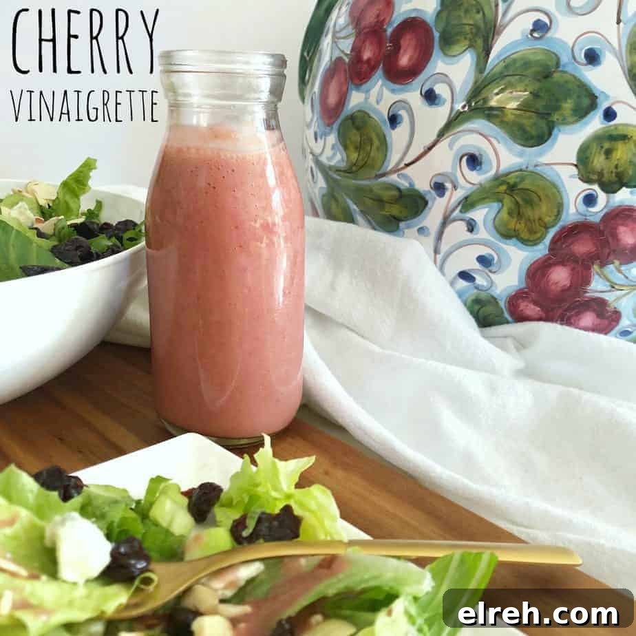 Cherry Vinaigrette Dressing with Balsamic and Honey 2 pink bottle of cherry vinaigrette with salad