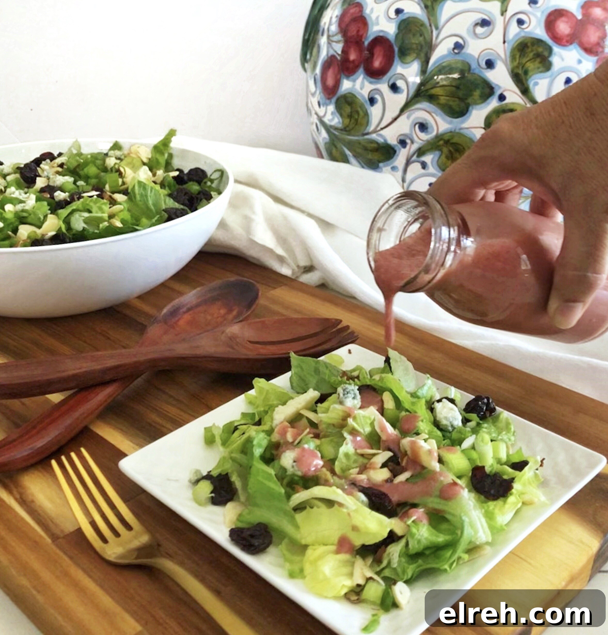 Cherry Vinaigrette Dressing with Balsamic and Honey 3 cherry vinaigrette pouring over cherry salad with gorgonzola and toasted almonds