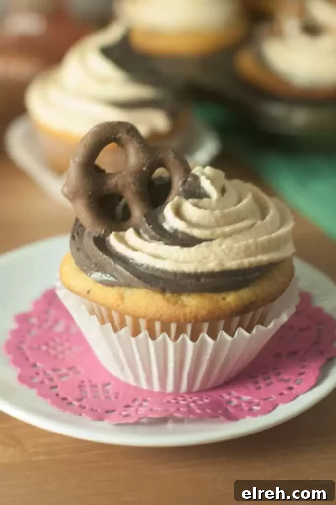 Chubby Hubby Cupcakes with Peanut Butter and Pretzels 3 Chubby Hubby cupcakes made with vanilla malt cake, chocolate-covered pretzels, peanut butter chips, and swirled frosting.