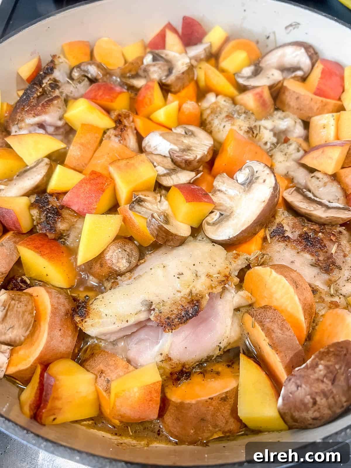 Maple Peach Chicken Thighs in a Dutch Oven 9 Boiling the dutch oven chicken thighs for a few minutes.