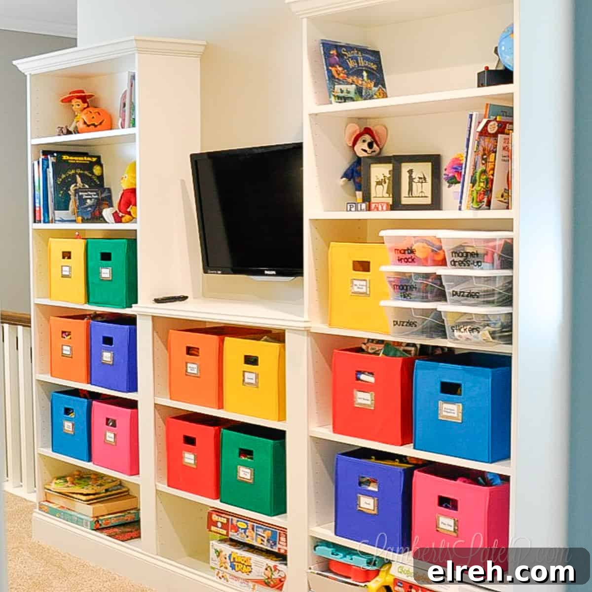 Turn IKEA Billy Bookcases into Built-In Shelving 2 ikea billy bookcase built-ins with colorful bins in a playroom.