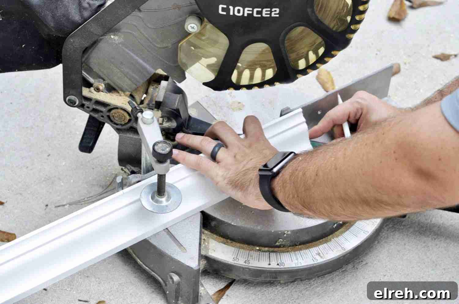 Turn IKEA Billy Bookcases into Built-In Shelving 12 cutting crown molding with a miter saw.