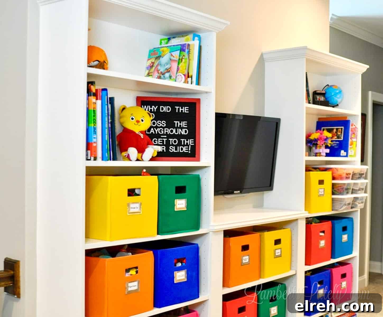 Turn IKEA Billy Bookcases into Built-In Shelving 18 ikea billy bookcase built-ins with colorful bins in a playroom.