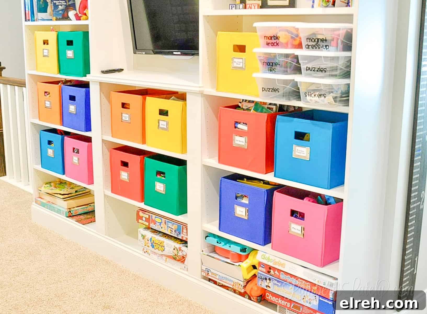 Turn IKEA Billy Bookcases into Built-In Shelving 19 ikea billy bookcase built-ins with colorful bins in a playroom.