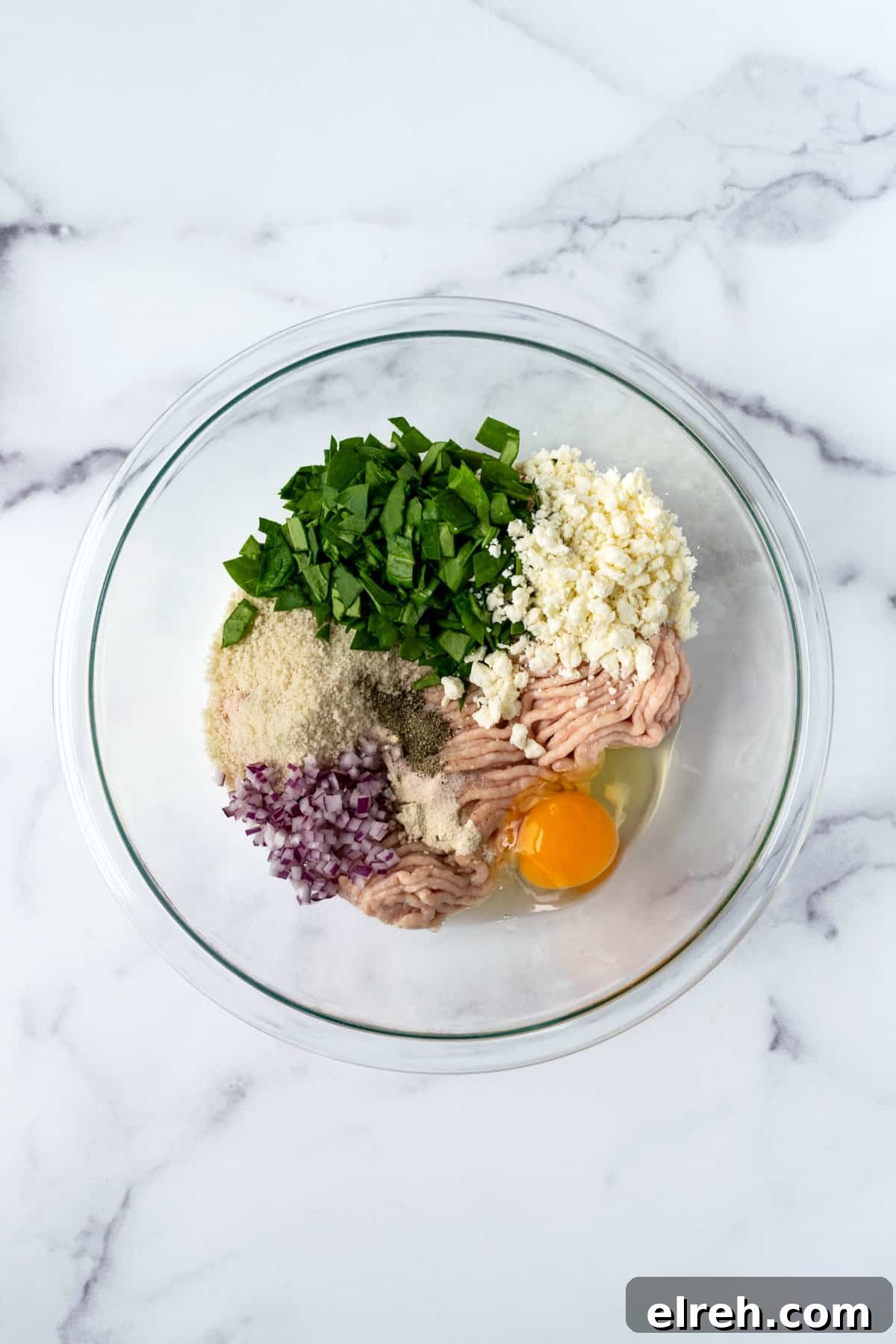 Greek Spinach Feta Chicken Burgers 4 Spinach Feta Chicken Burgers Ingredients in a Bowl.