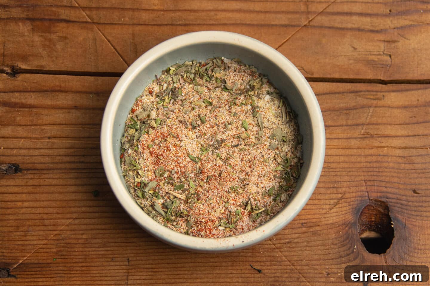 Seasonings mixed together in a small bowl.
