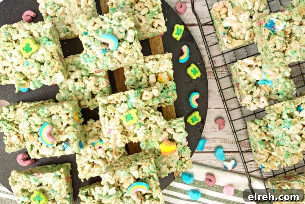 overhead view of lucky charms rice krispie treats spread on a platter