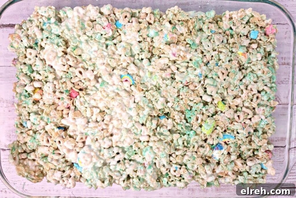 spread rice krispie marshmallow mixture in pan