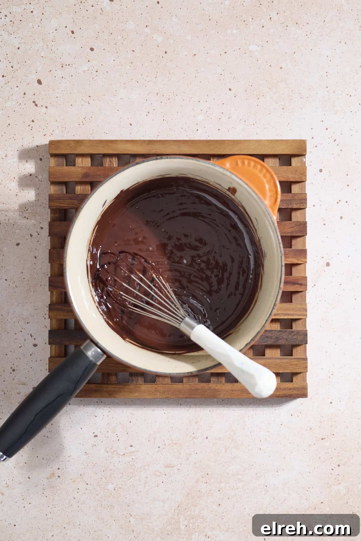 Butter and chocolate mixture in a saucepan.