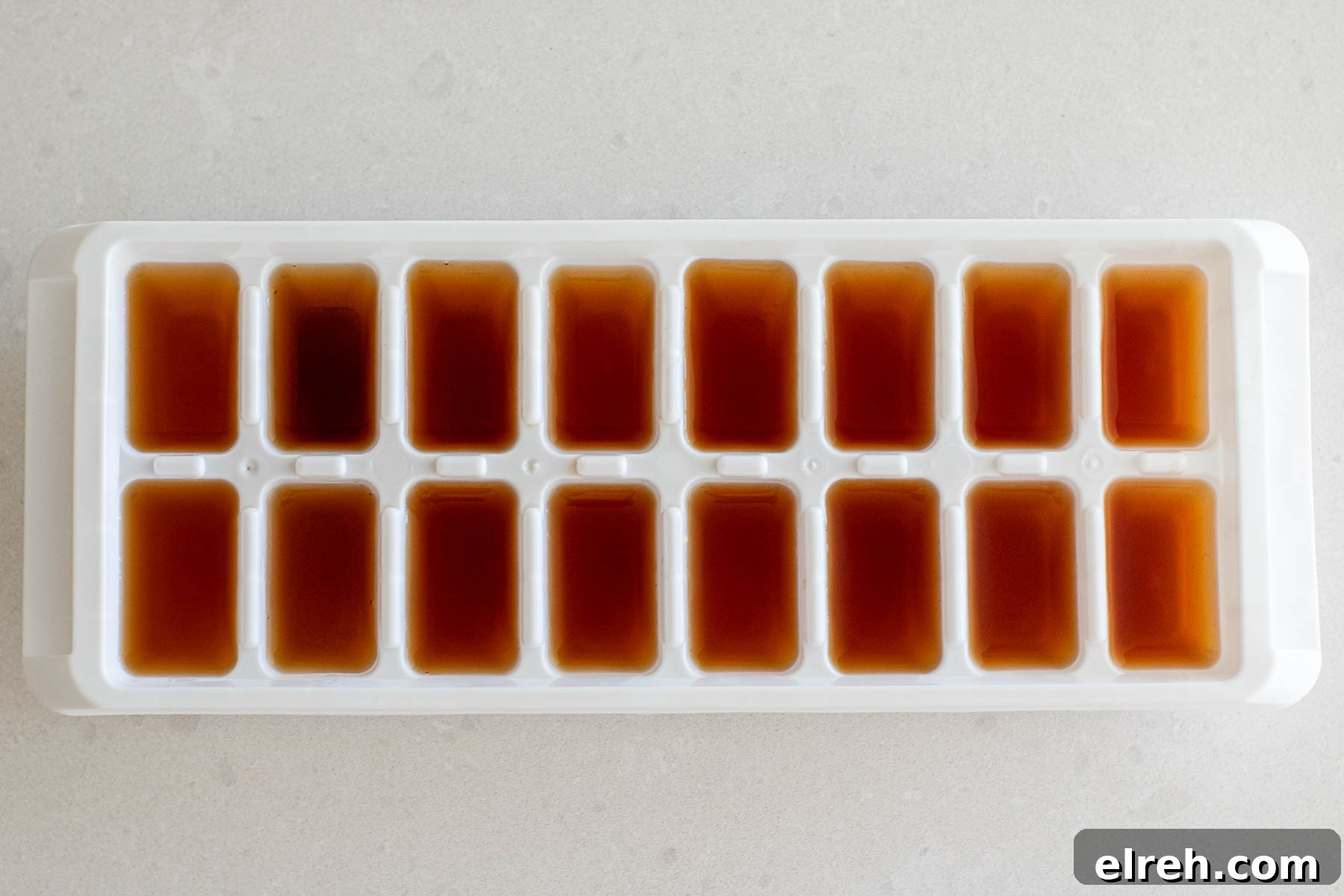 How to Make Tea Ice Cubes for Iced Tea, Lattes and Cocktails 5 Ice cube tray filled with black tea.