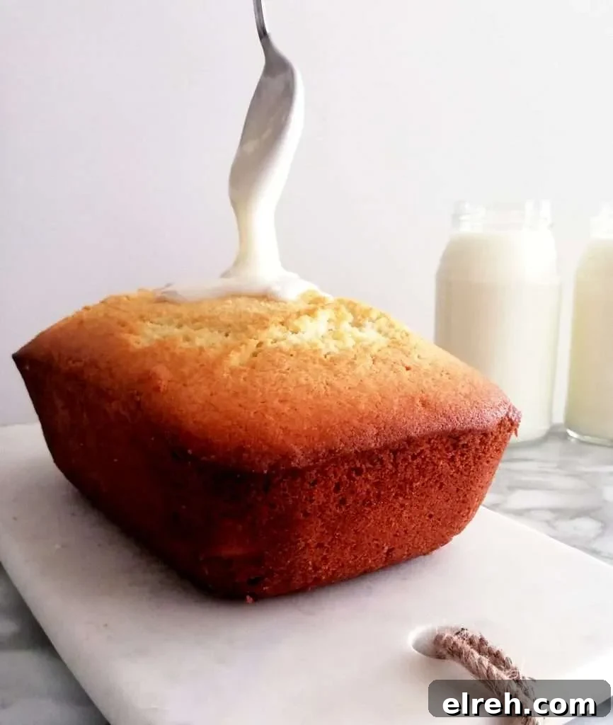 Moist Sour Cream Pound Cake Recipe 5 sour cream pound cake pouring glaze on top of cake
