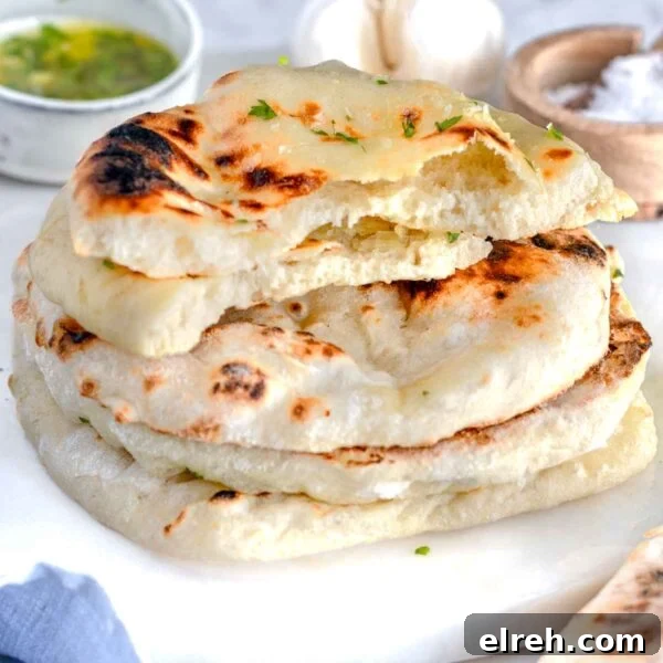 Classic Split Pea Soup Recipe with Ham 13 Naan bread stacked on a marble plate