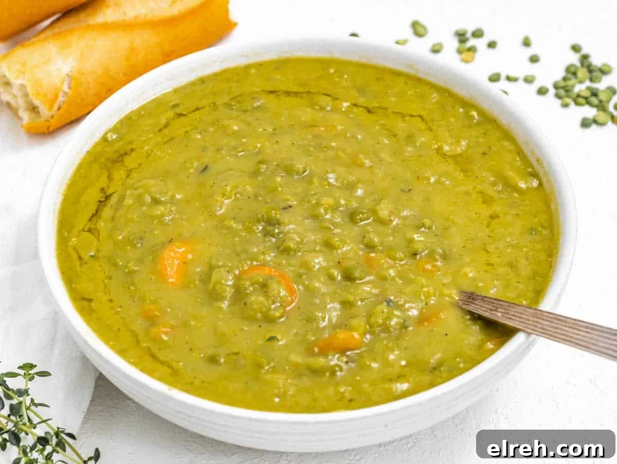 Classic Split Pea Soup Recipe with Ham 14 Split peas soup with silver spoon