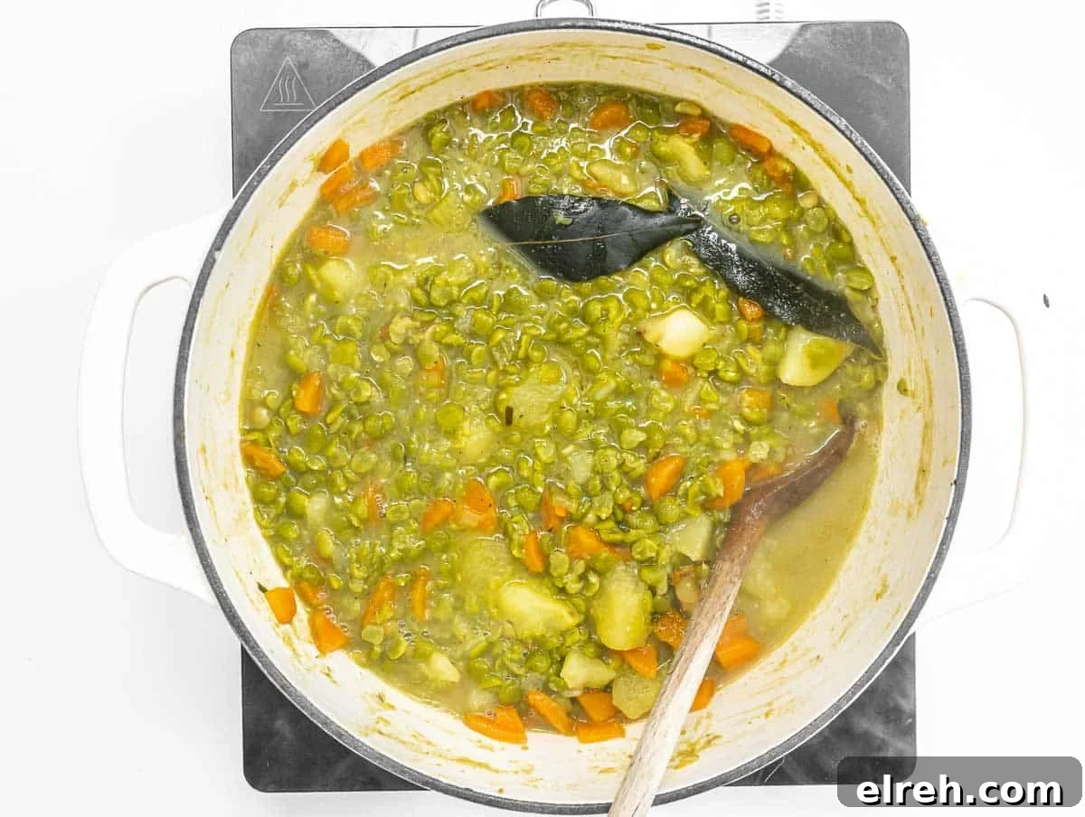 Classic Split Pea Soup Recipe with Ham 9 Potatoes and vegetables in a pot