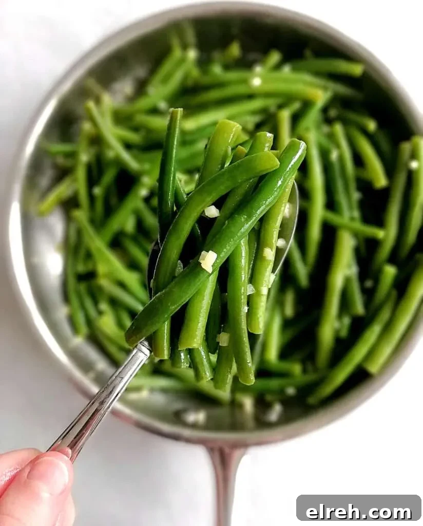 garlic green beans in spoon