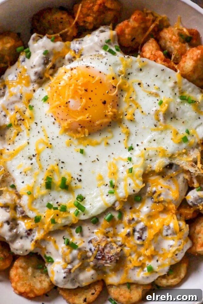 Southern Tater Tot Breakfast with Sausage Gravy and Eggs 3 tater tots with sausage gravy and fried egg