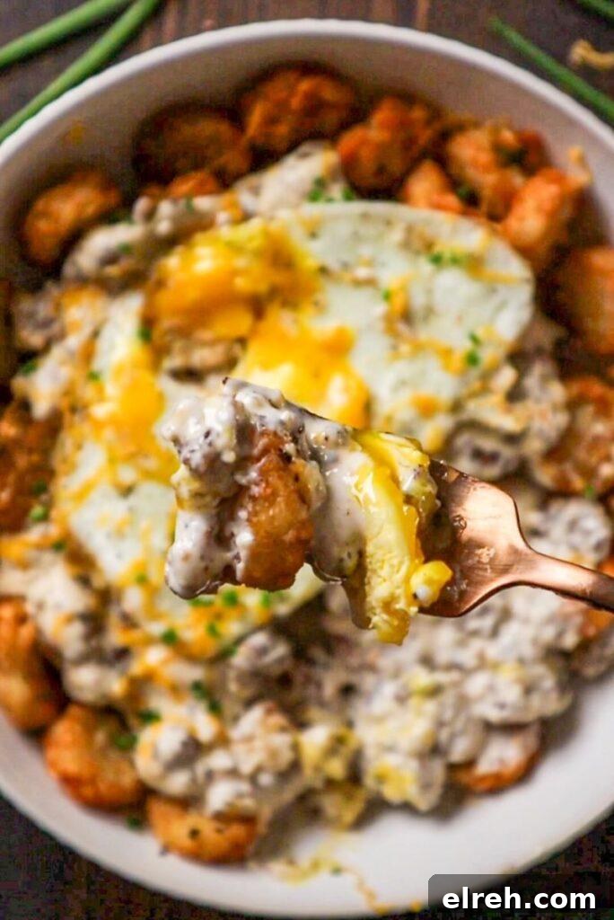 Southern Tater Tot Breakfast with Sausage Gravy and Eggs 5 fork with tater tots gravy and egg