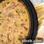 Slow Cooker Queso with Beef and Sausage 7 slow cooker with spicy queso