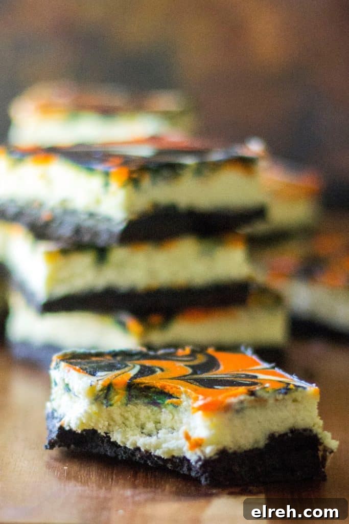 Spooky Halloween Cheesecake Bars with Candy Corn Swirl 6 Finished Halloween Cheesecake Bars