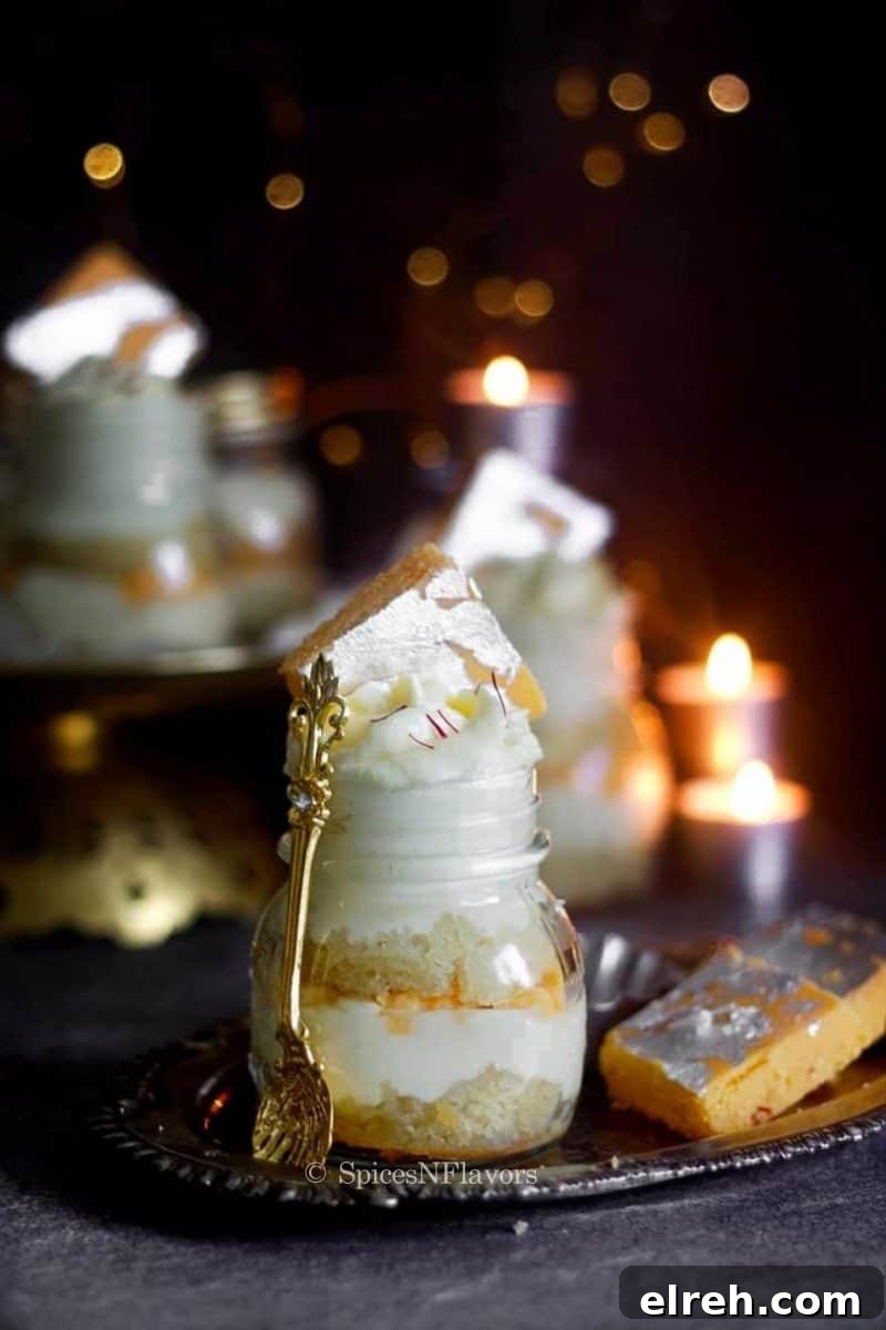 burfi cake placed on a silver oval plate with barfi on the side