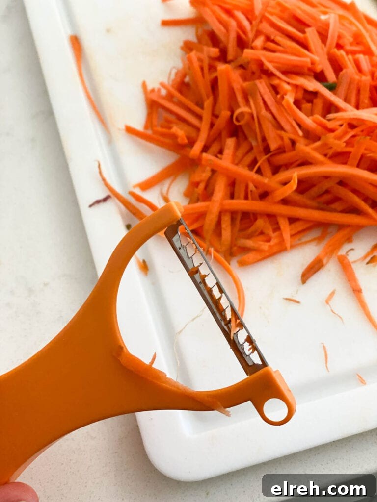 Ground Beef Stir-Fry Recipe with Vegetables 5 A matchstick peeler with peeled carrots in the background