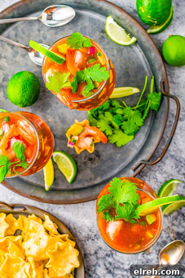 Authentic Mexican Shrimp Cocktail Recipe 3 Mexican Shrimp Cocktail in glasses with tortilla chips.
