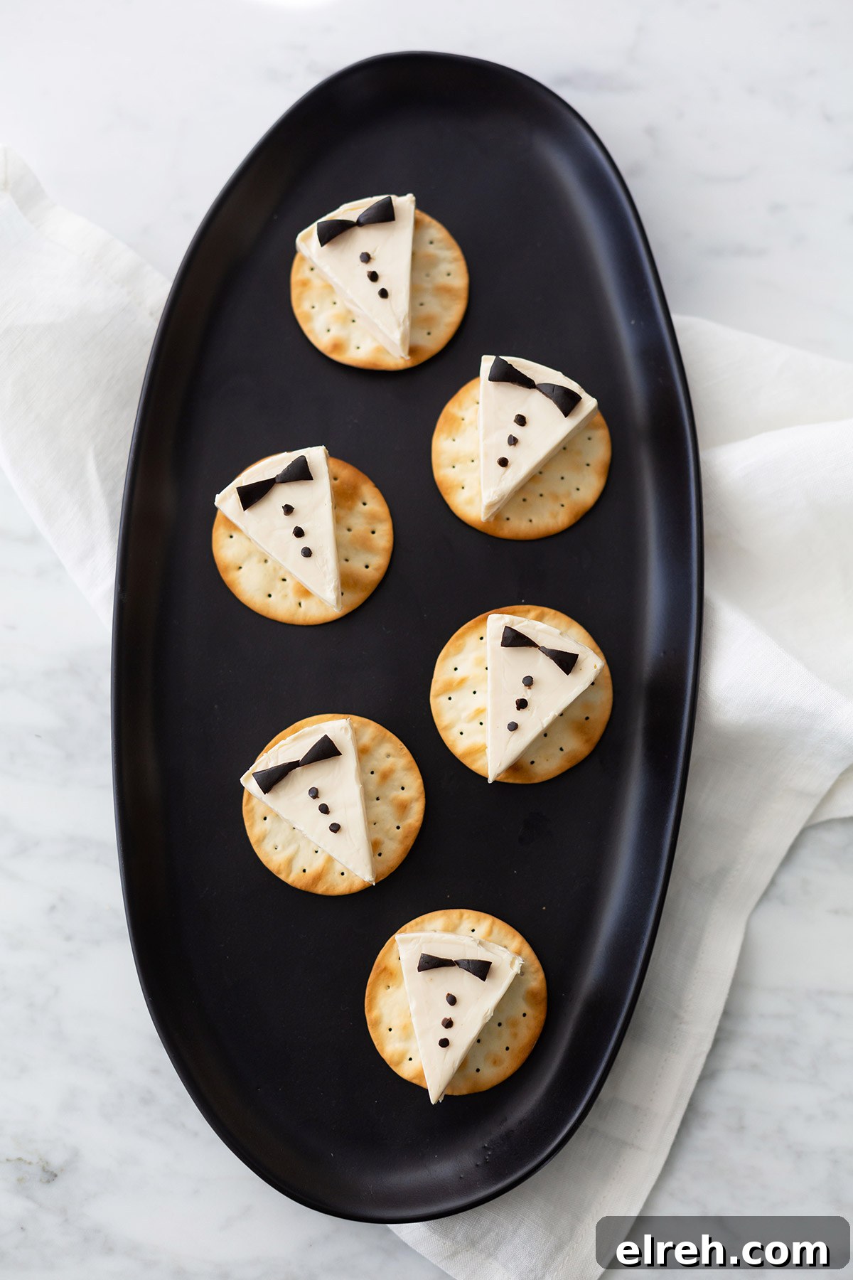 Tuxedo Cheese Crackers for Parties 3 Cheese crackers decorated like tuxedos