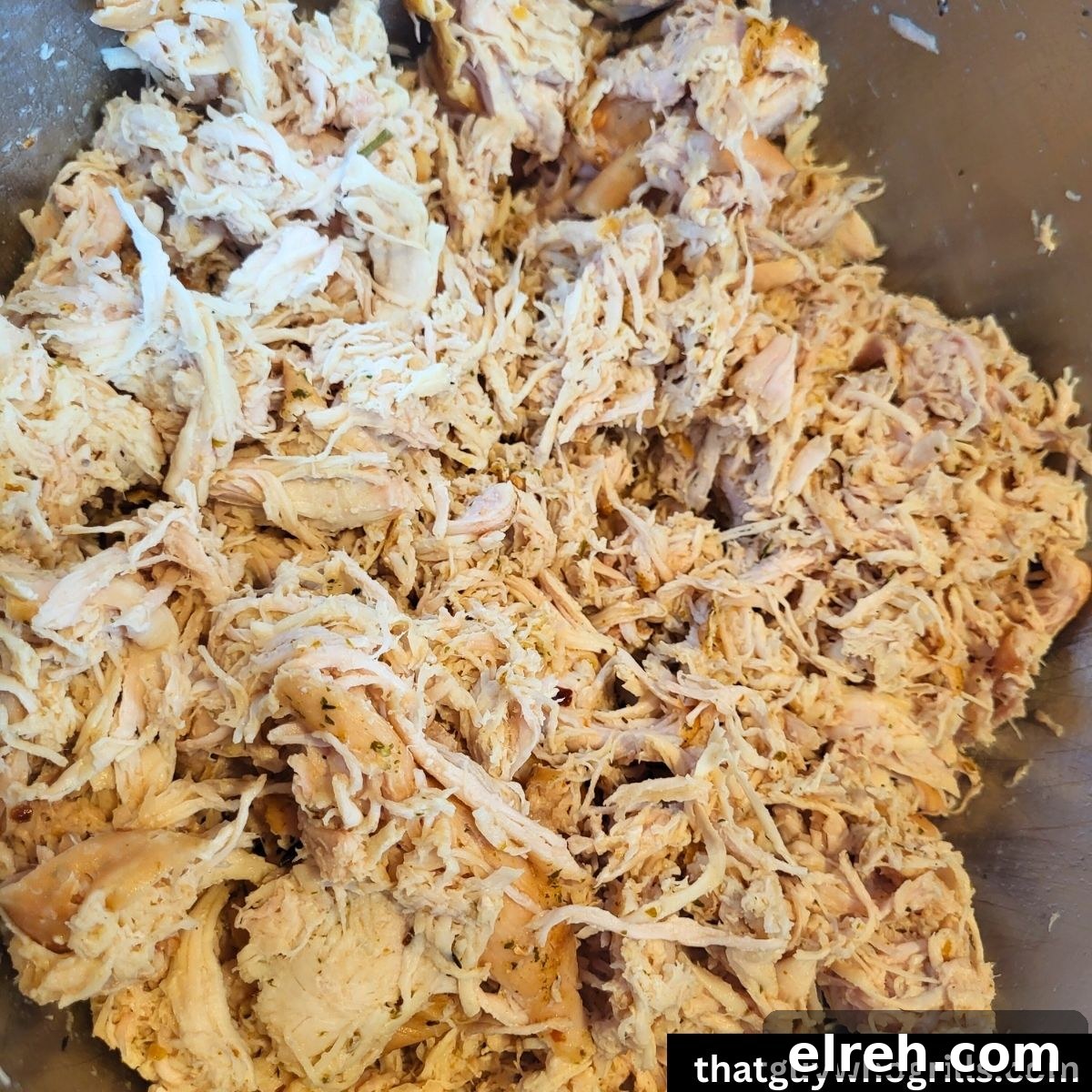 Smoked Chicken Recipes for Tender, Flavorful Results 8 shredded Smoked chicken in mixing bowl