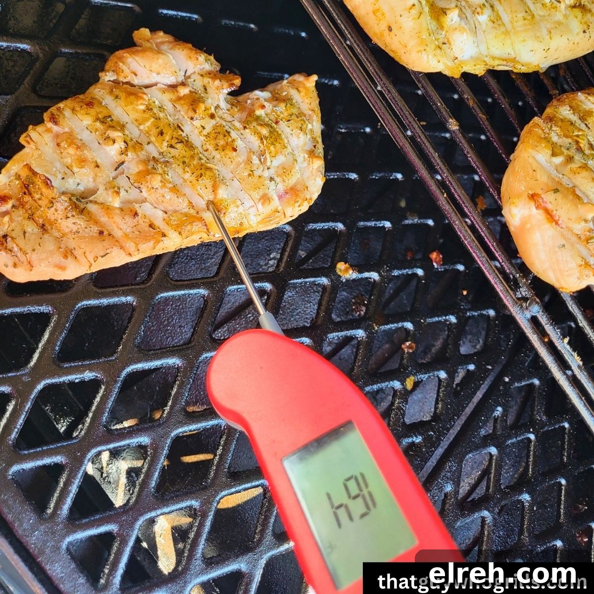 Smoked Chicken Recipes for Tender, Flavorful Results 3 Smoked Chicken breasts being temped by a therma pen