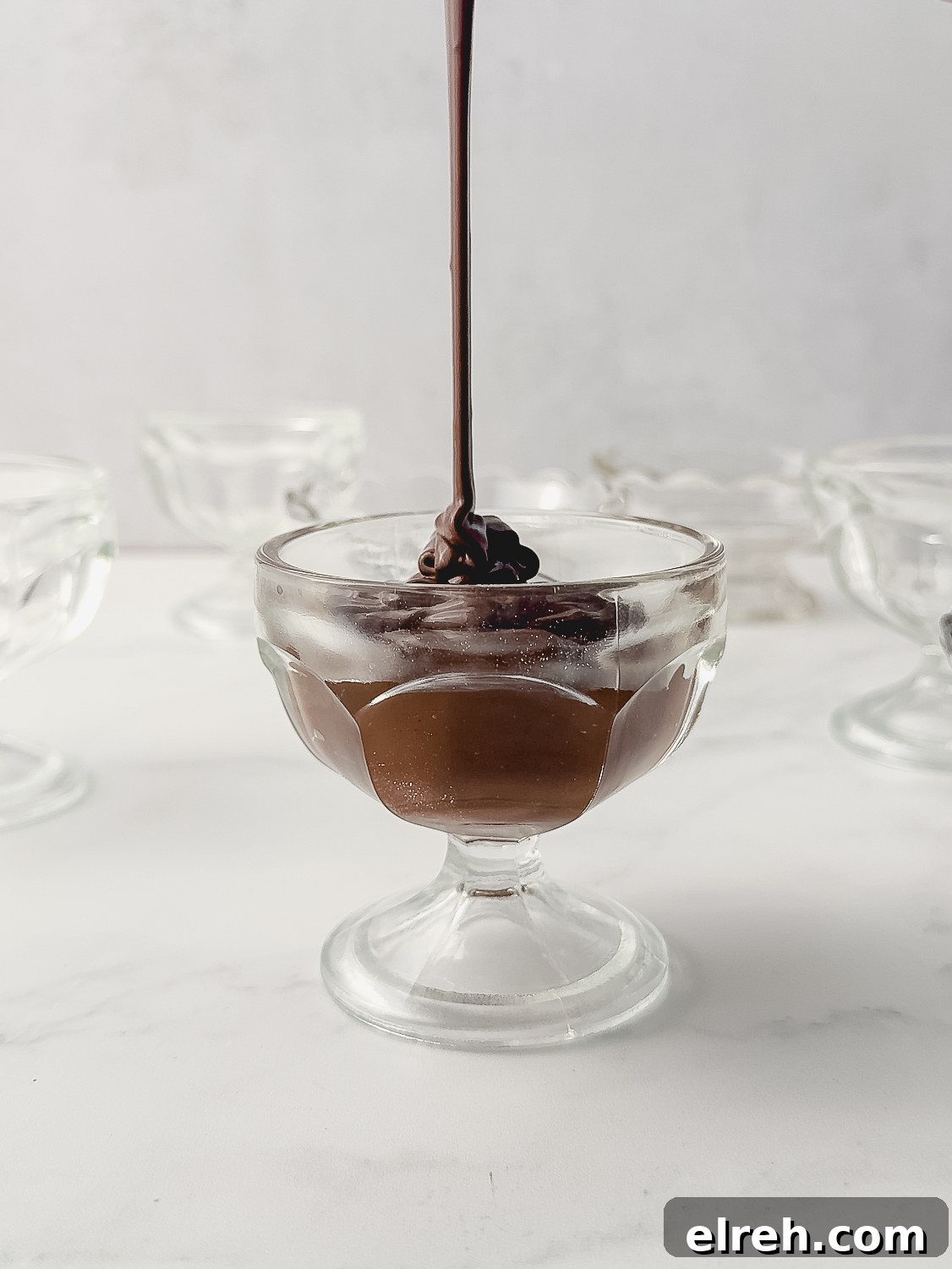 Creamy Homemade Chocolate Pudding Recipe 7 Straining pudding through a sieve