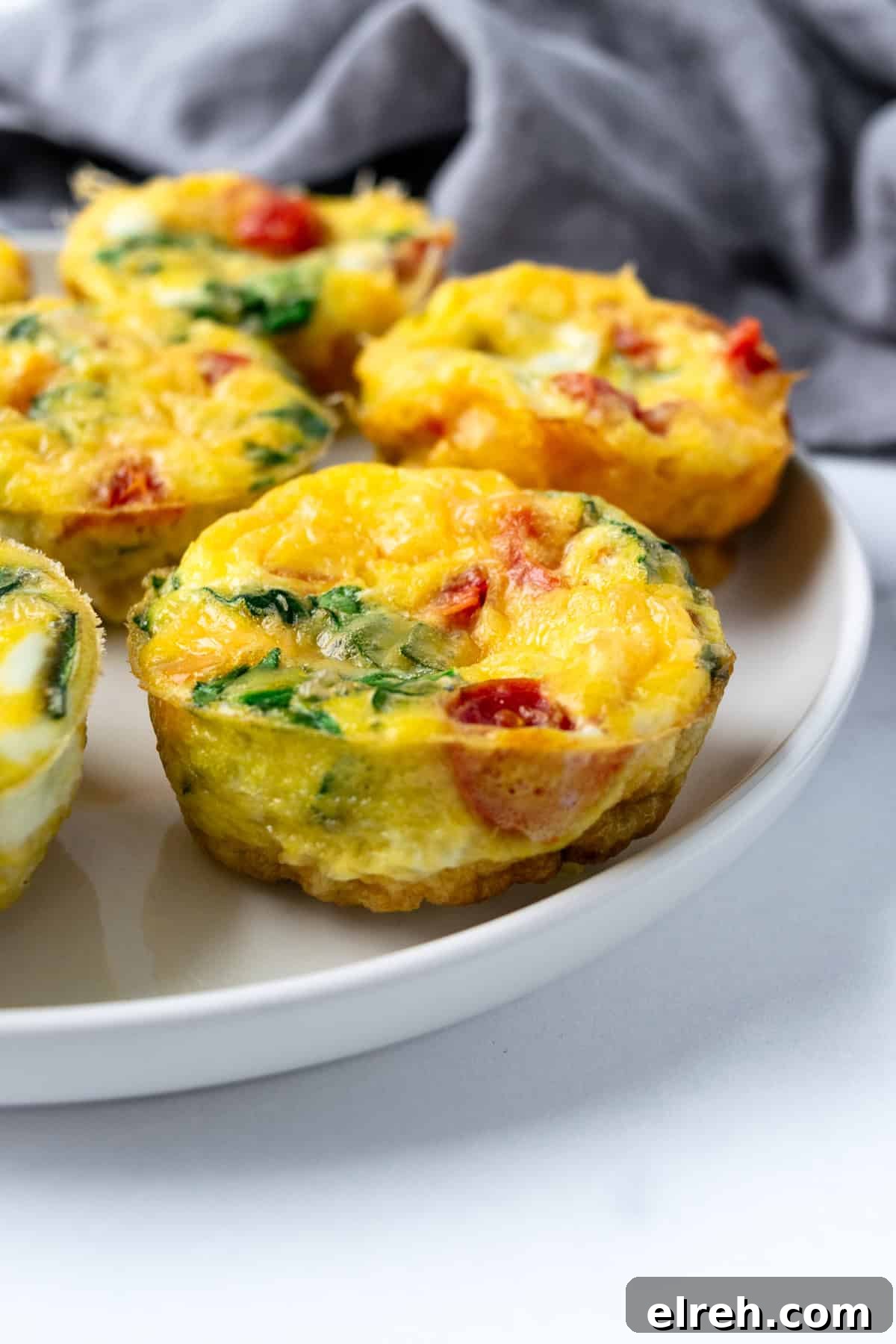Veggie Egg Bites on a white plate.